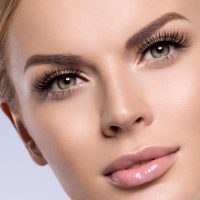 Beauty face woman with beautiful lashes healthy skin